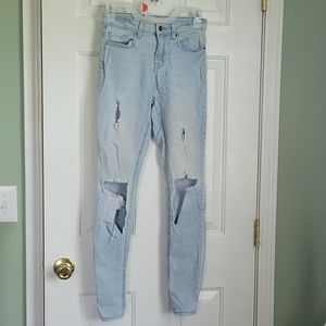 Forever 21 light blue, heavily ripped jeans sz 25
